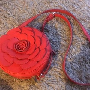 Charming Charlie’s red flower purse